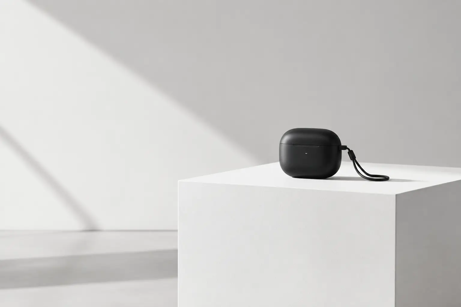 A precision pod device arranged on a white studio desk